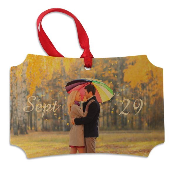 Add warmth to your holiday decor this year with our custom photo maple wood ornament.