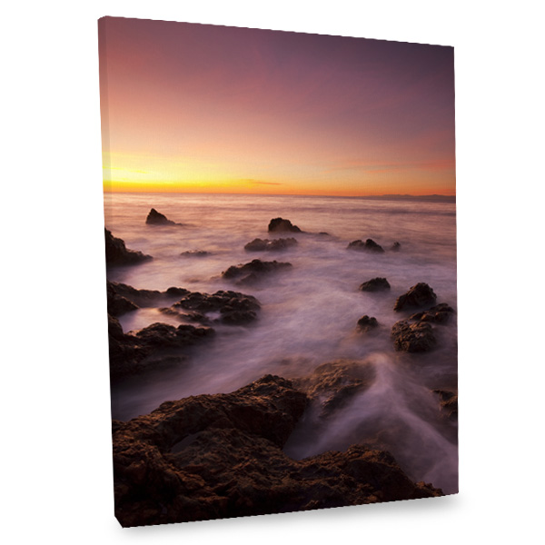 Our stunning canvas print showcases the ocean at dusk for added elegance to your decor.