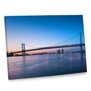 With its stunning sunset colors, our bridge at dusk canvas will add intrigue to your home decor.
