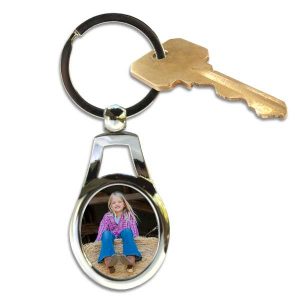 Create a quality metal oval key ring with a photo of your choosing.