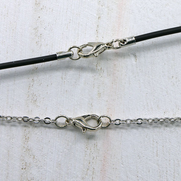 Each photo necklace has a standard clasp to close the chain or cord