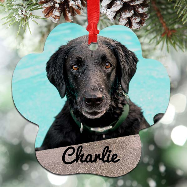 Add a picture of your furry pet to an aluminum paw ornament